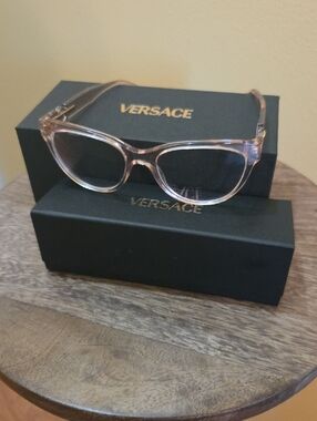 Versace Transparent Pink Eyeglasses.